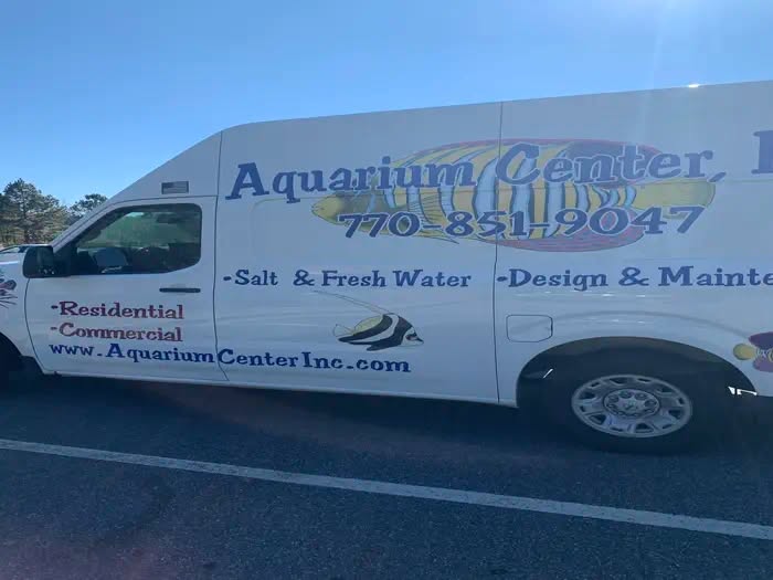 The Aquarium Center service van — Residential & Commercial, Salt & Fresh Water